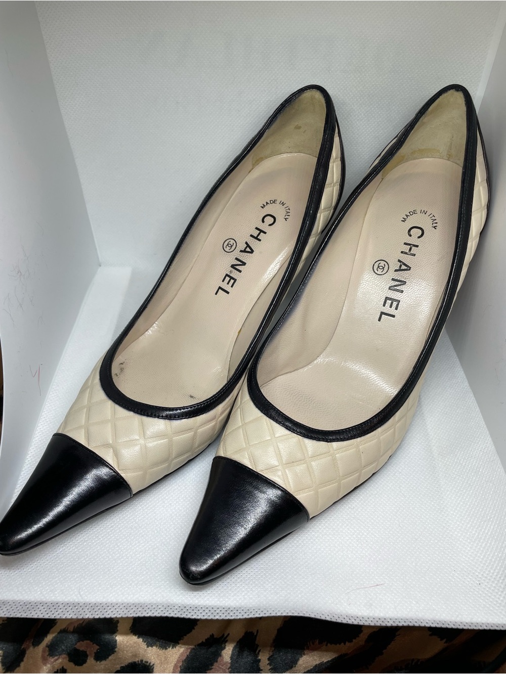 CHANEL Cream Quilted Leather Pointed Toe Flats with Black Cap Toe Made in Italy